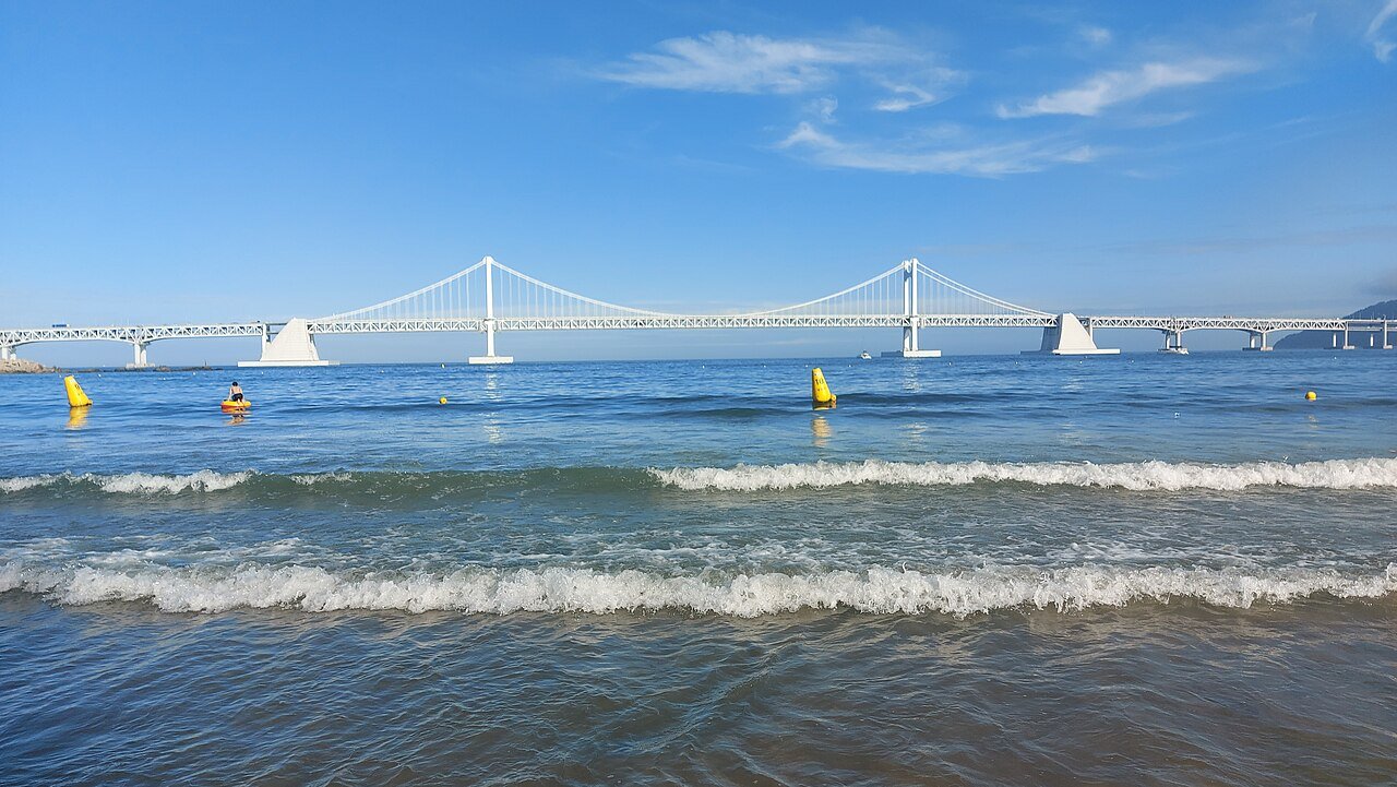 Gwangalli Beach in Busan with Gwangan Bridge across the bay