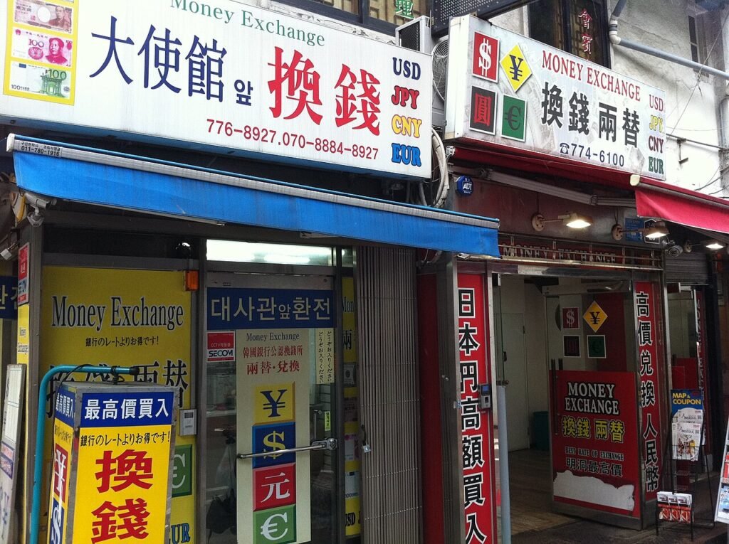 Dense shop signs above Myeongdong shopping street in Seoul