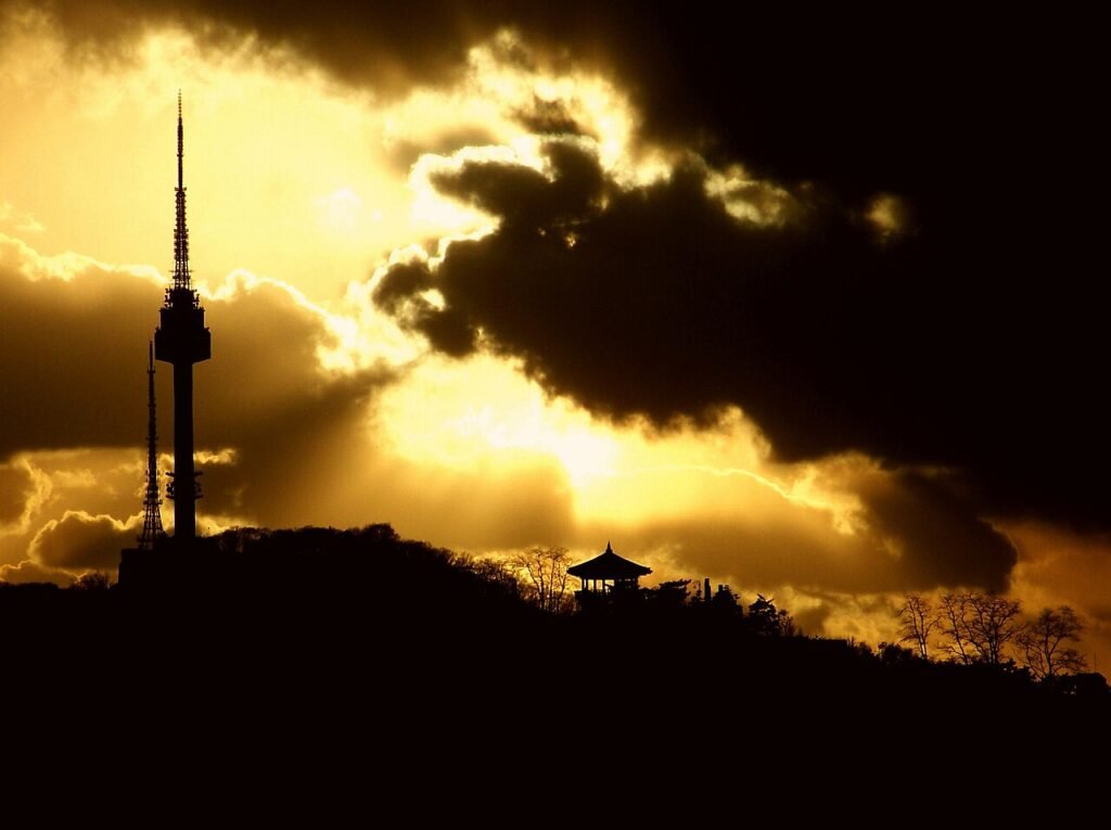 N Seoul Tower on Namsan at sunset above Seoul