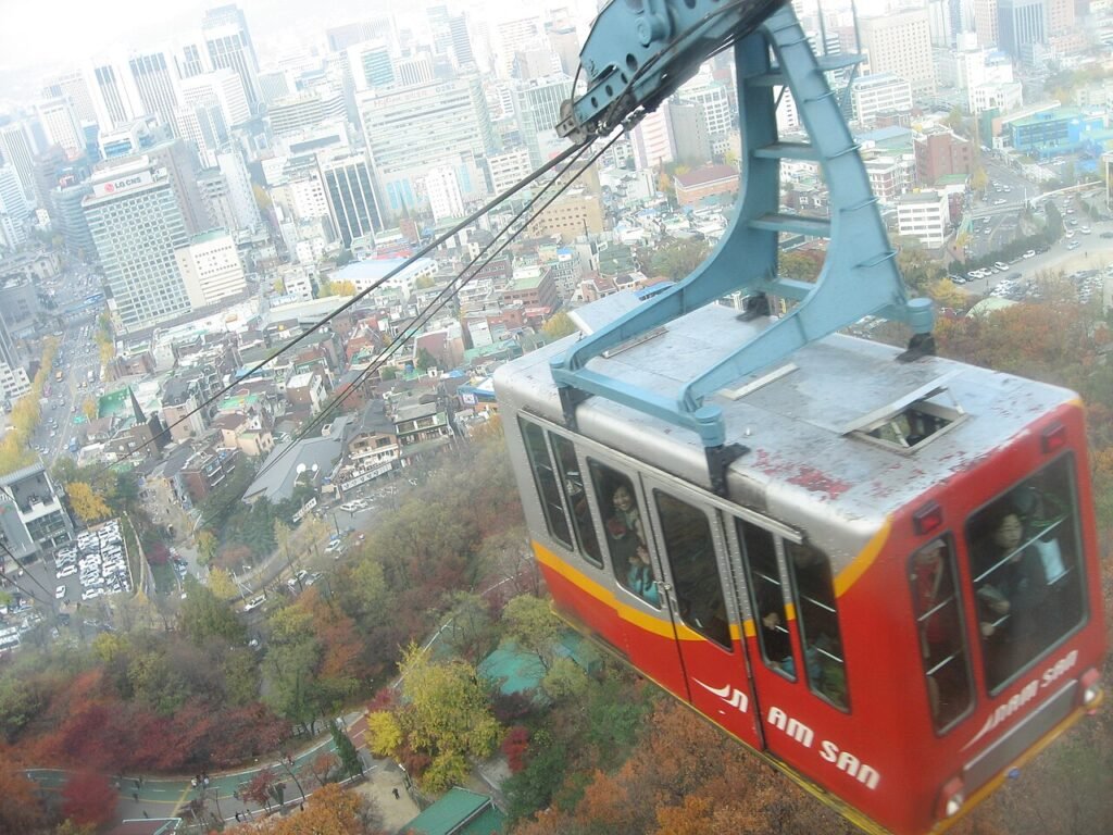 Namsan cable car climbing above the trees toward N Seoul Tower in Seoul