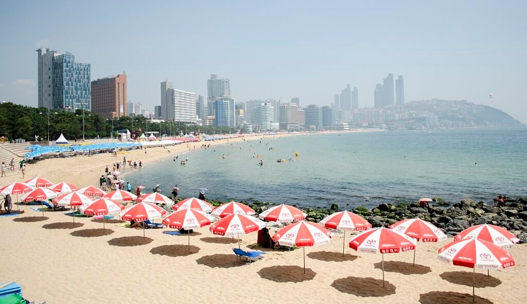 The wide sandy shoreline of Haeundae Beach in Busan