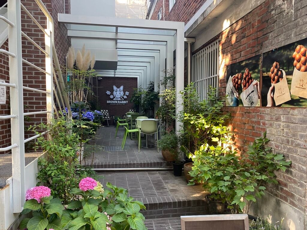 A flower-decorated cafe storefront in the Seongsu district of Seoul