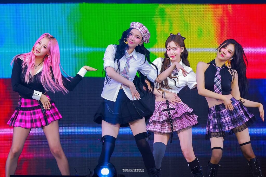 aespa, SM Entertainment's flagship group, performing at an SMTOWN concert