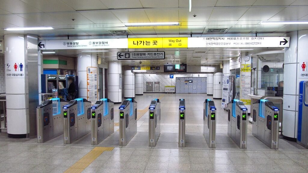 Tapping through T-money fare gates at Myeongdong Station, Seoul subway
