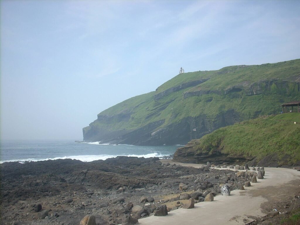 Beach and lighthouse on Udo Island off the coast of Jeju