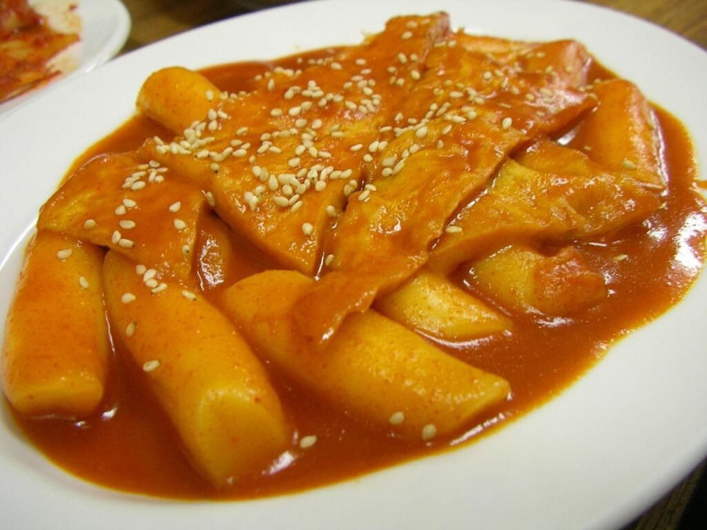 Spicy Korean tteokbokki rice cakes in red gochujang sauce