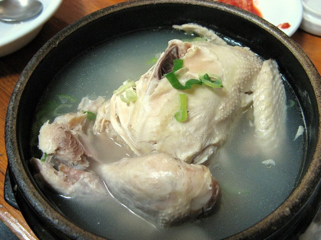 Korean chicken soup (samgyetang) served in a stone bowl