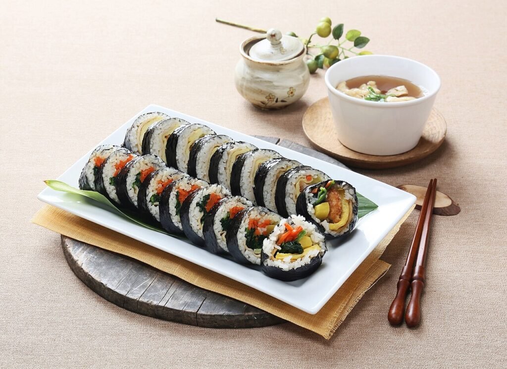 Sliced Korean gimbap rice rolls arranged on a plate