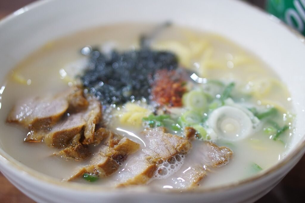 Jeju-style pork noodle soup (gogi-guksu) in a bowl