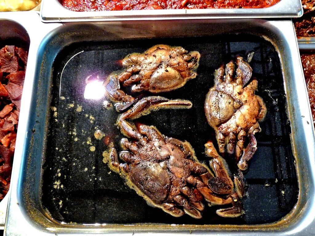 Korean soy-marinated crab (gejang) at Dongmun Market in Jeju