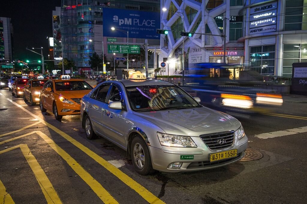 Seoul taxis waiting in line on a city street