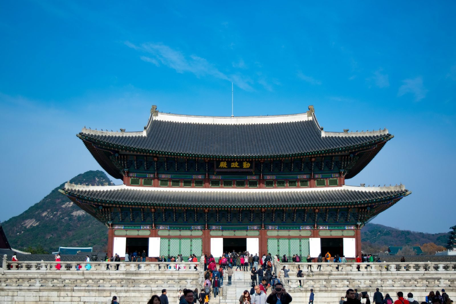 Geunjeongjeon throne hall standing behind its stone courtyard at Gyeongbokgung Palace