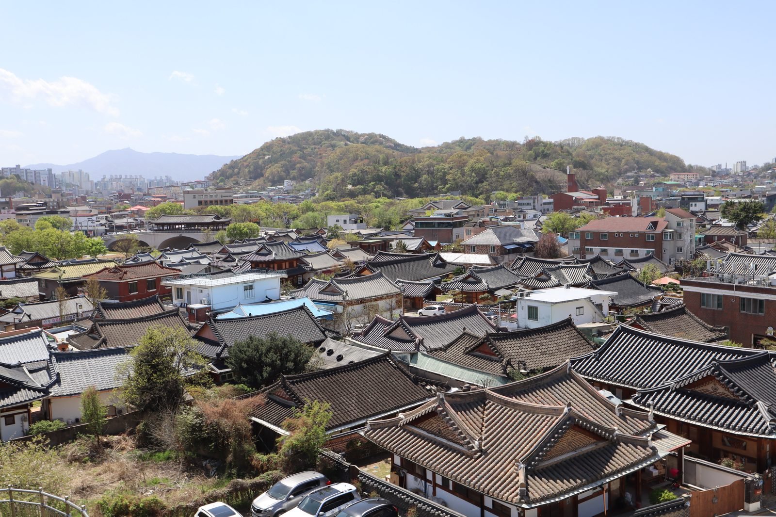 Grey tiled hanok roofs lining a street in Jeonju Hanok Village