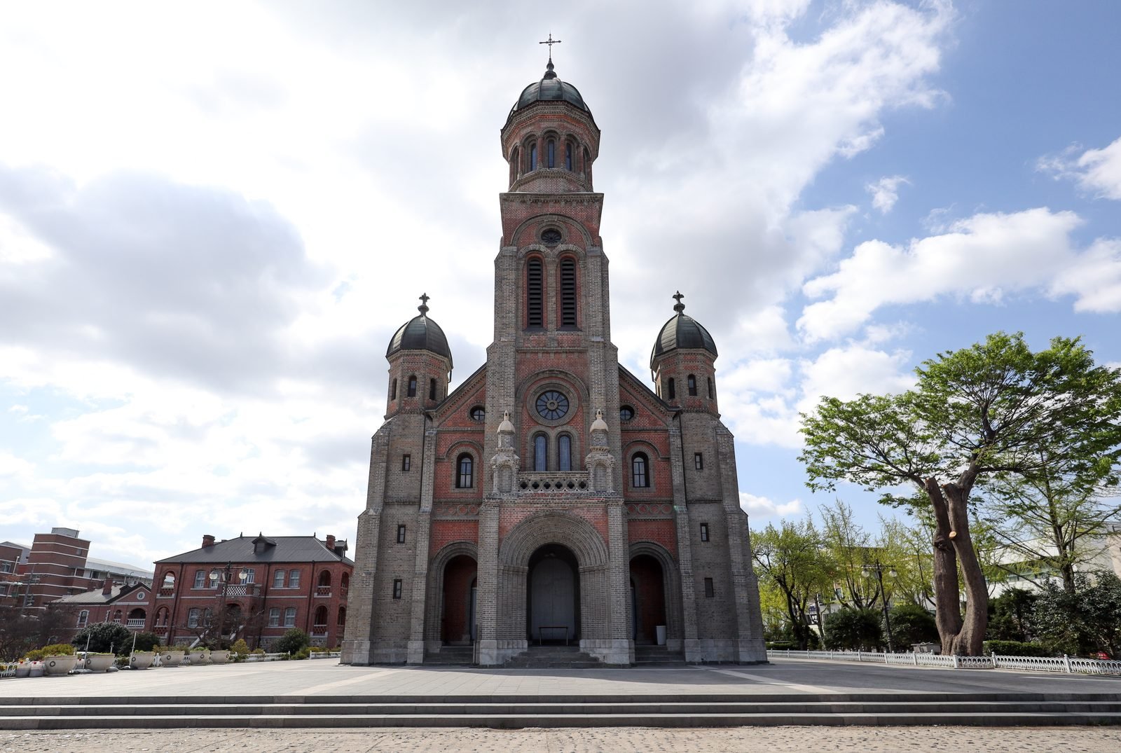 Jeondong Catholic Cathedral's domed facade across from Gyeonggijeon Shrine in Jeonju